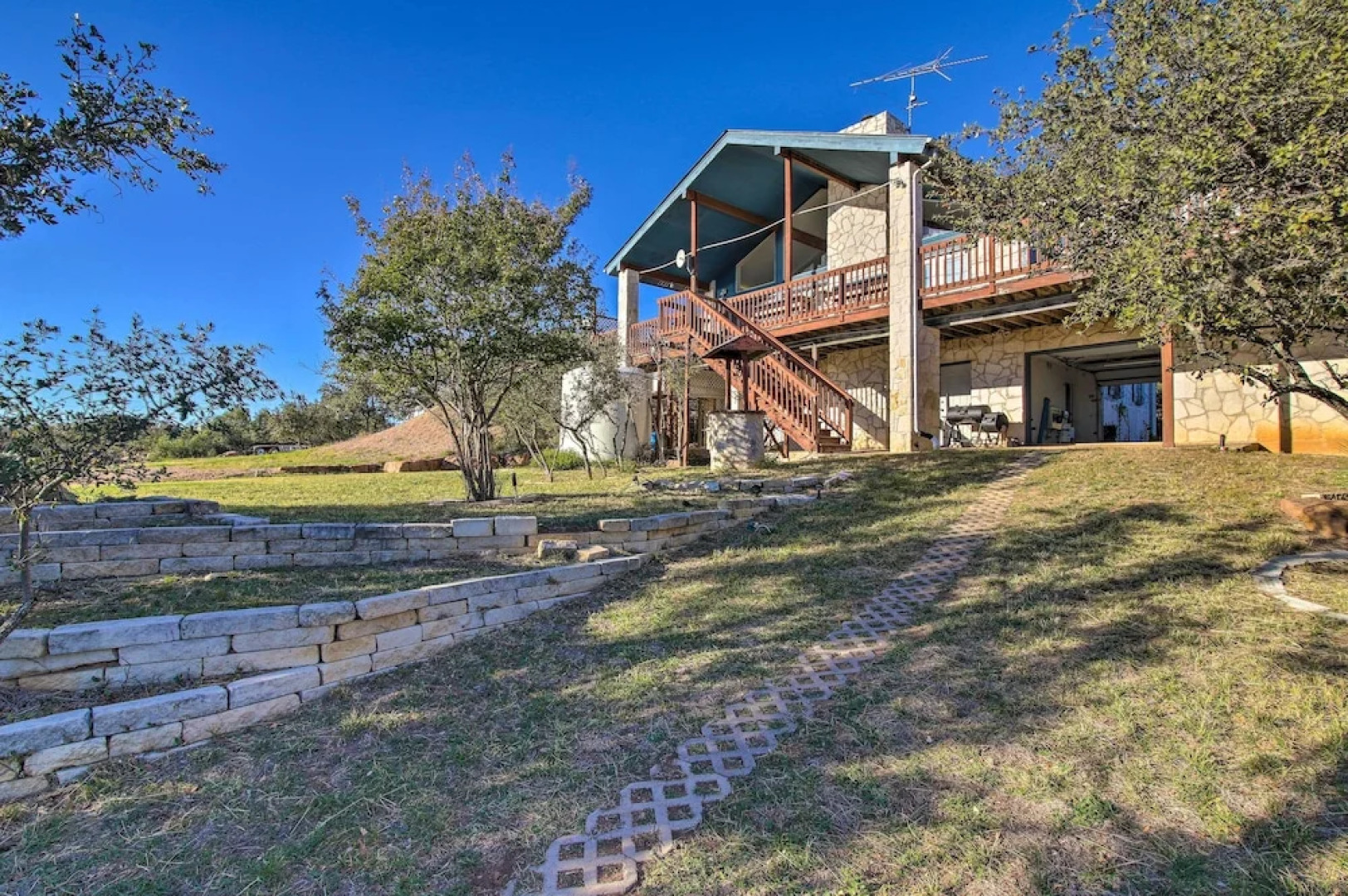 Sunny Lakefront Escape w/ Private Beach & Deck