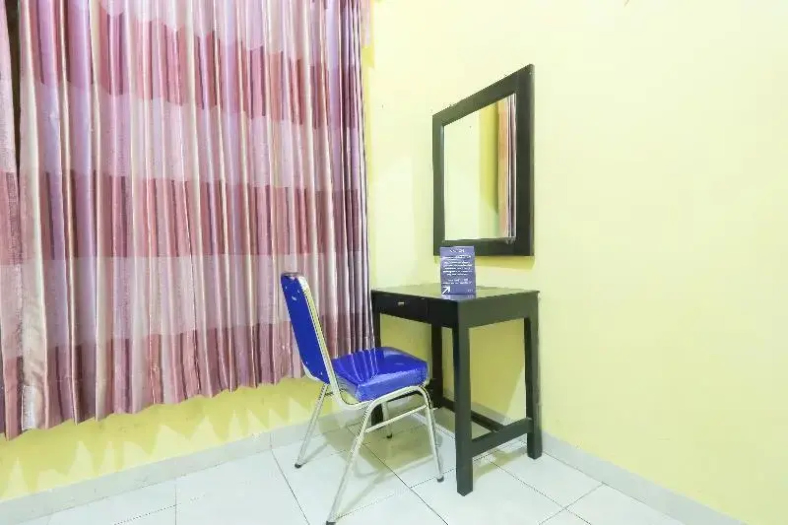 SPOT ON 2440 Wallet Family Residence