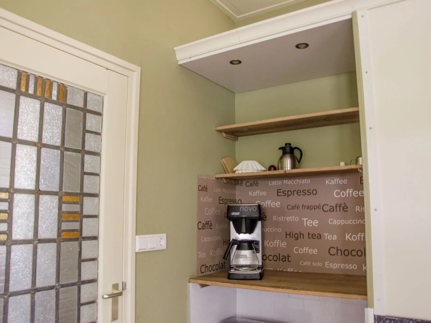 Characteristic house with a garden, surrounded by forest