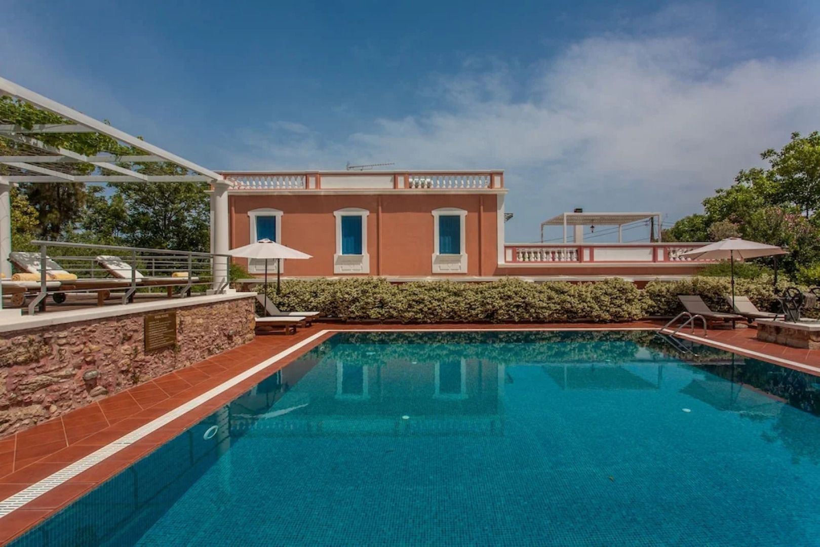 Dine on the Generous Veranda at a Rustic Stone Getaway