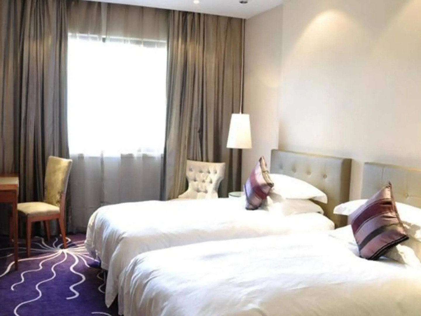 Budgetel Huadu Yiwu Hotel