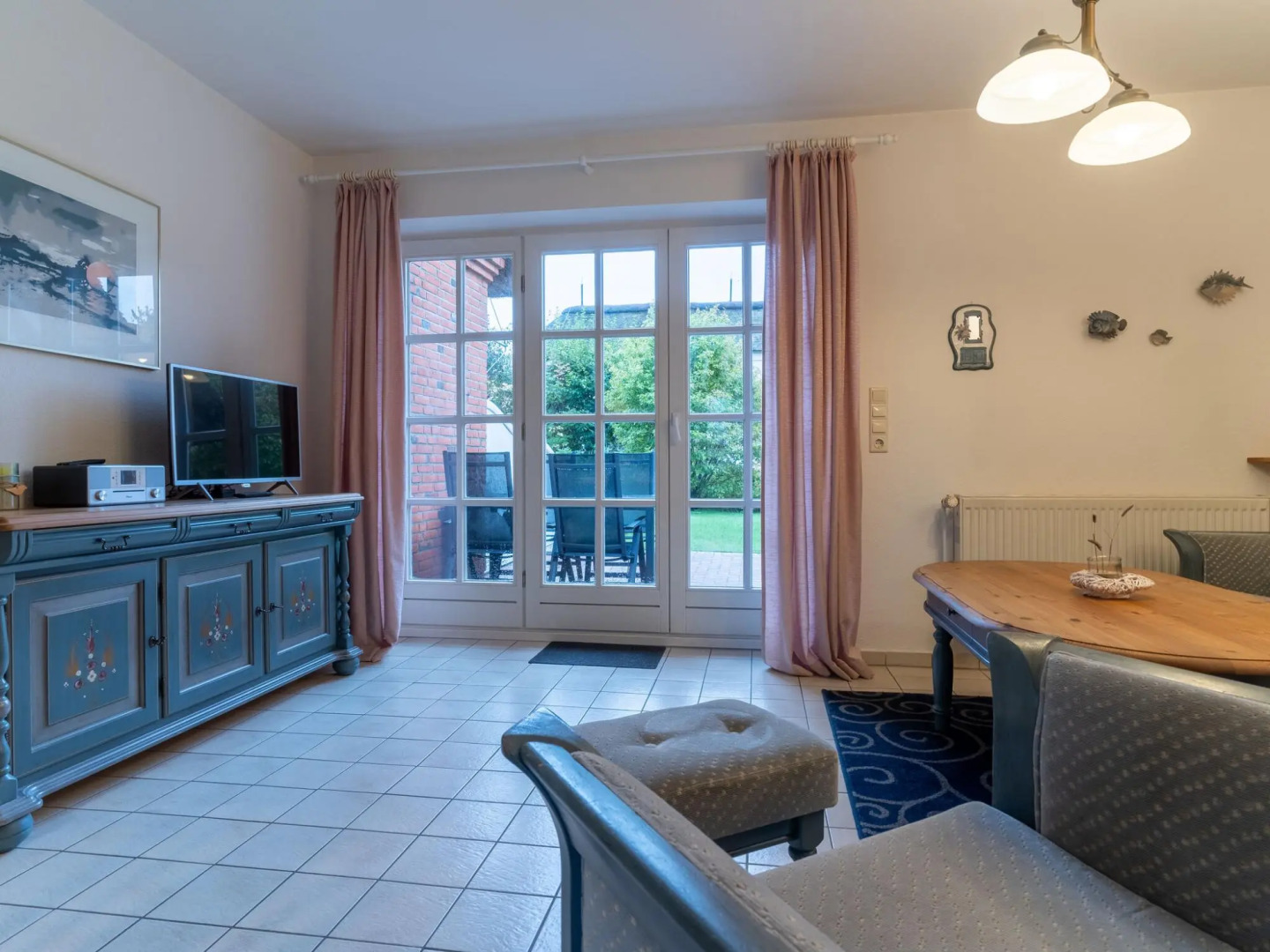 Holiday apartment with a fireplace in a thatched apartment house