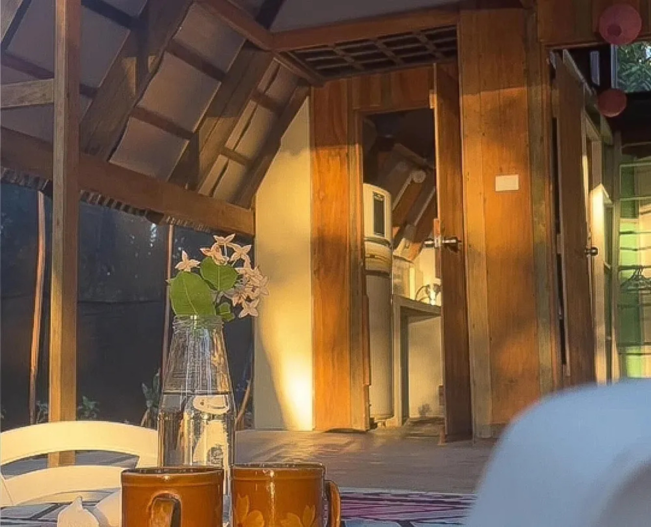 Surrounded By Trees In Front Of The Sea