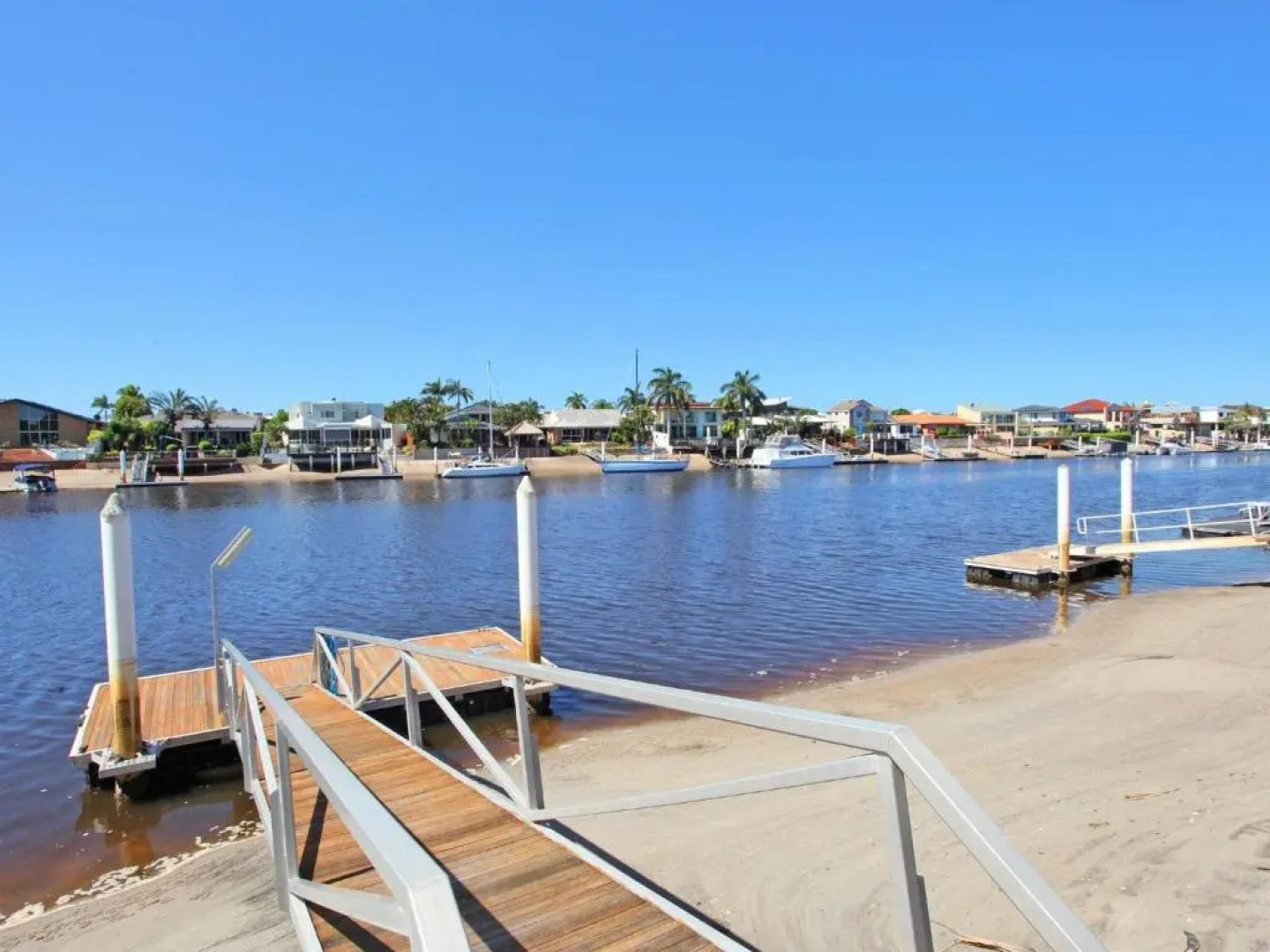 Outstanding Waterfront Hamptons Style 5 Bedroom Luxurious Home with Air Conditioning Pool and Pontoon -Bring your own boat