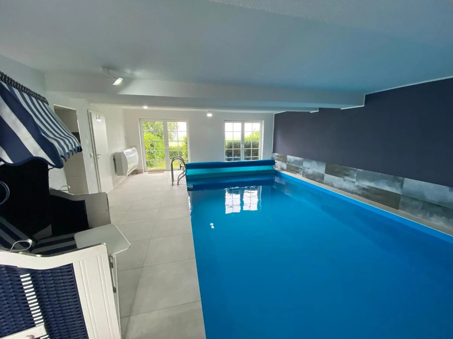 Ferienwohnung im Poolhaus mit Ostseeblick