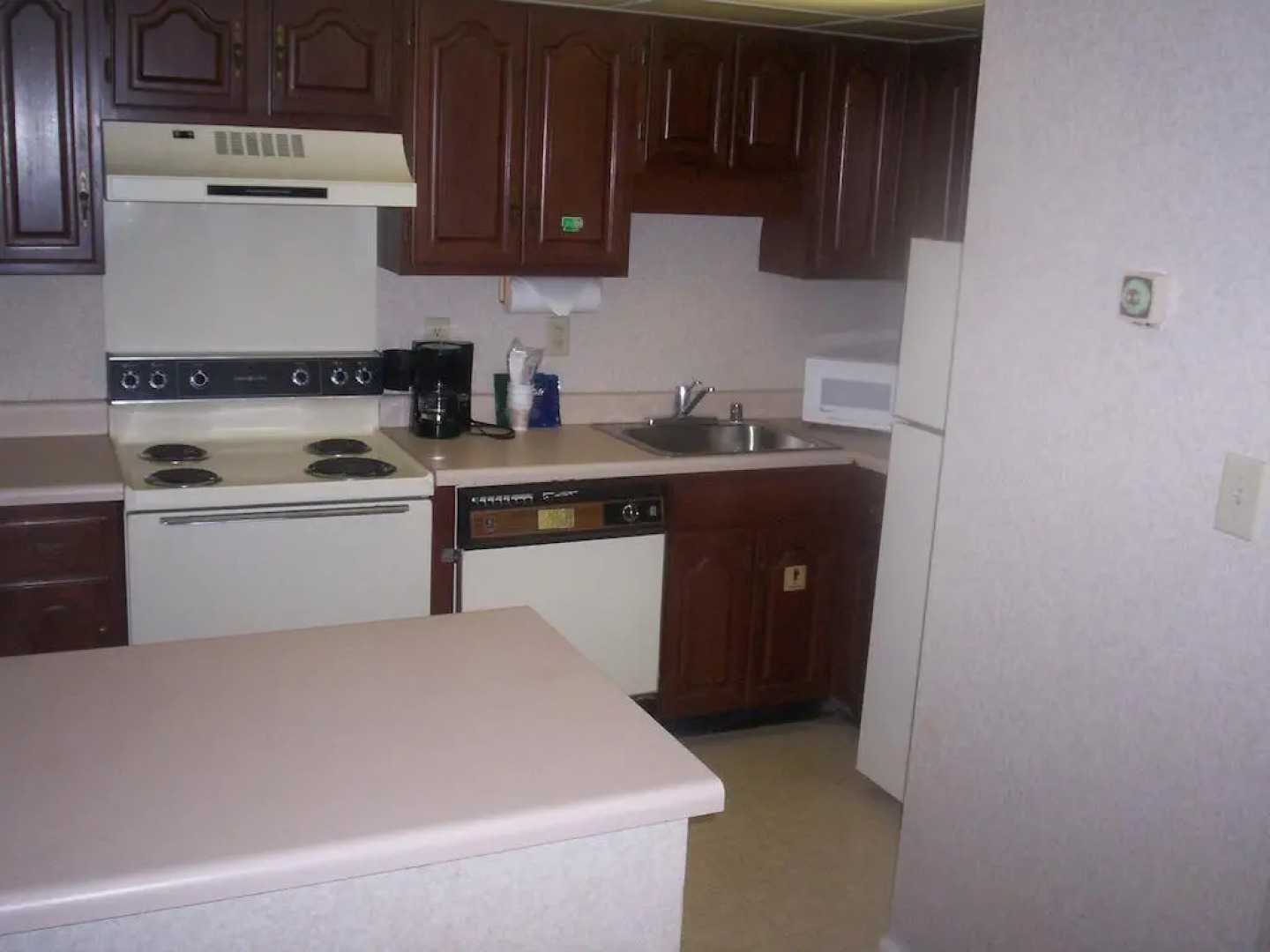 Rime Garden Inn & Suites