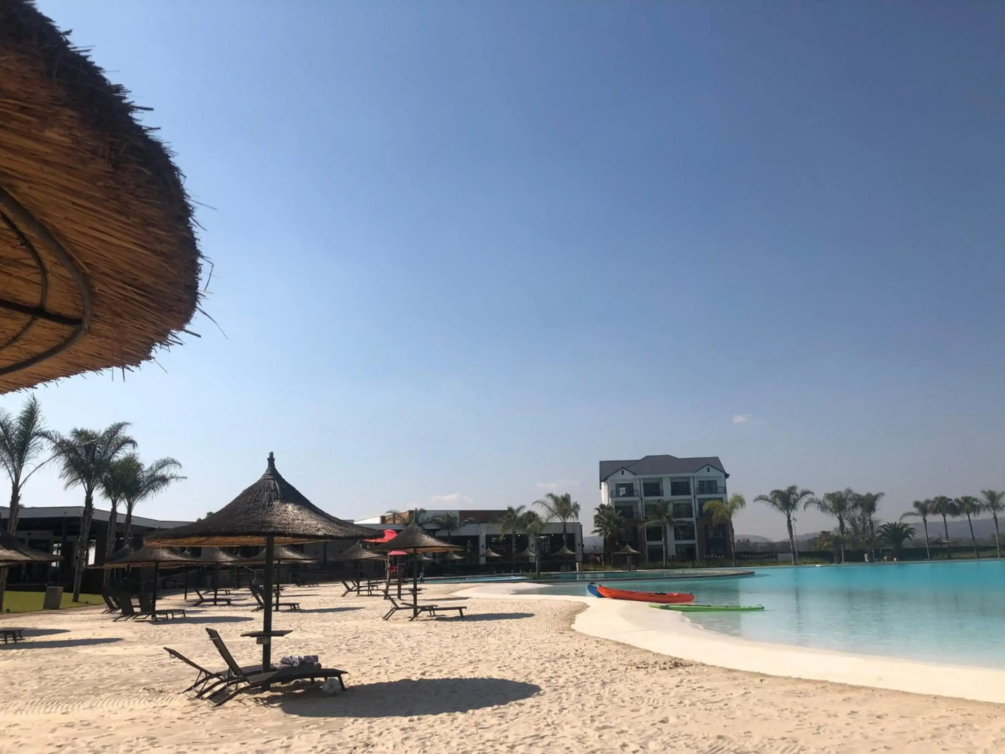 A Coastal/island experience at a Large 2 bed apartment at a Crystal Lagoon Estate.