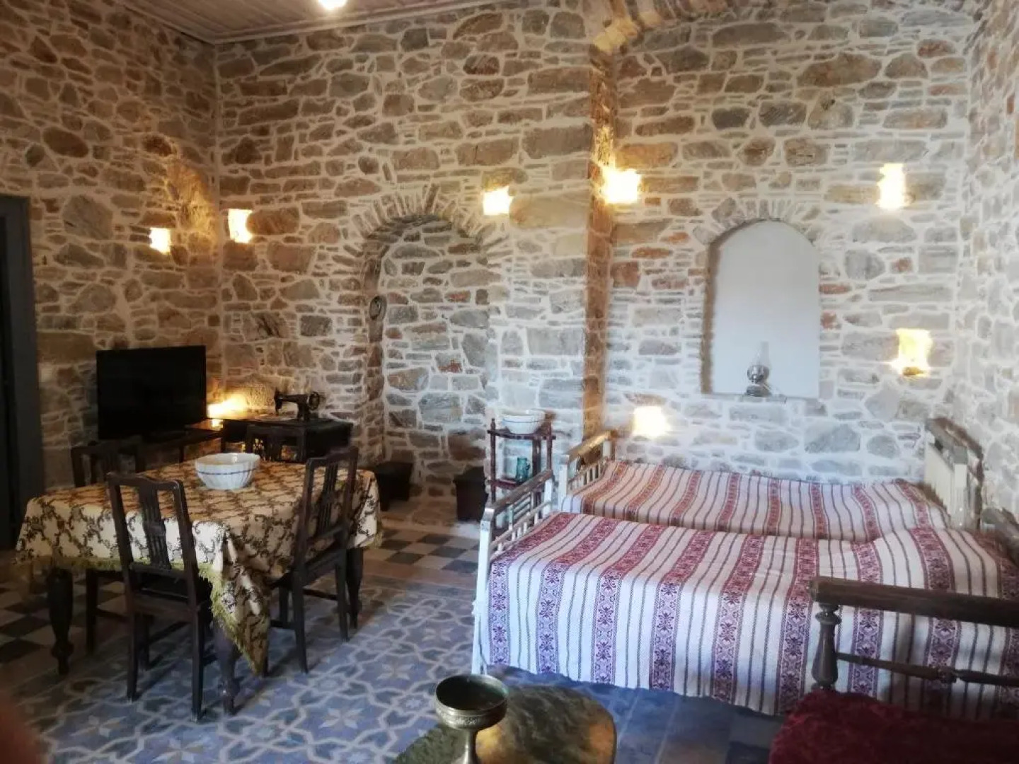 "Fasolas square house" is located 30 stairs up from the main road and it is in the old market "fasolas" and next to the museums