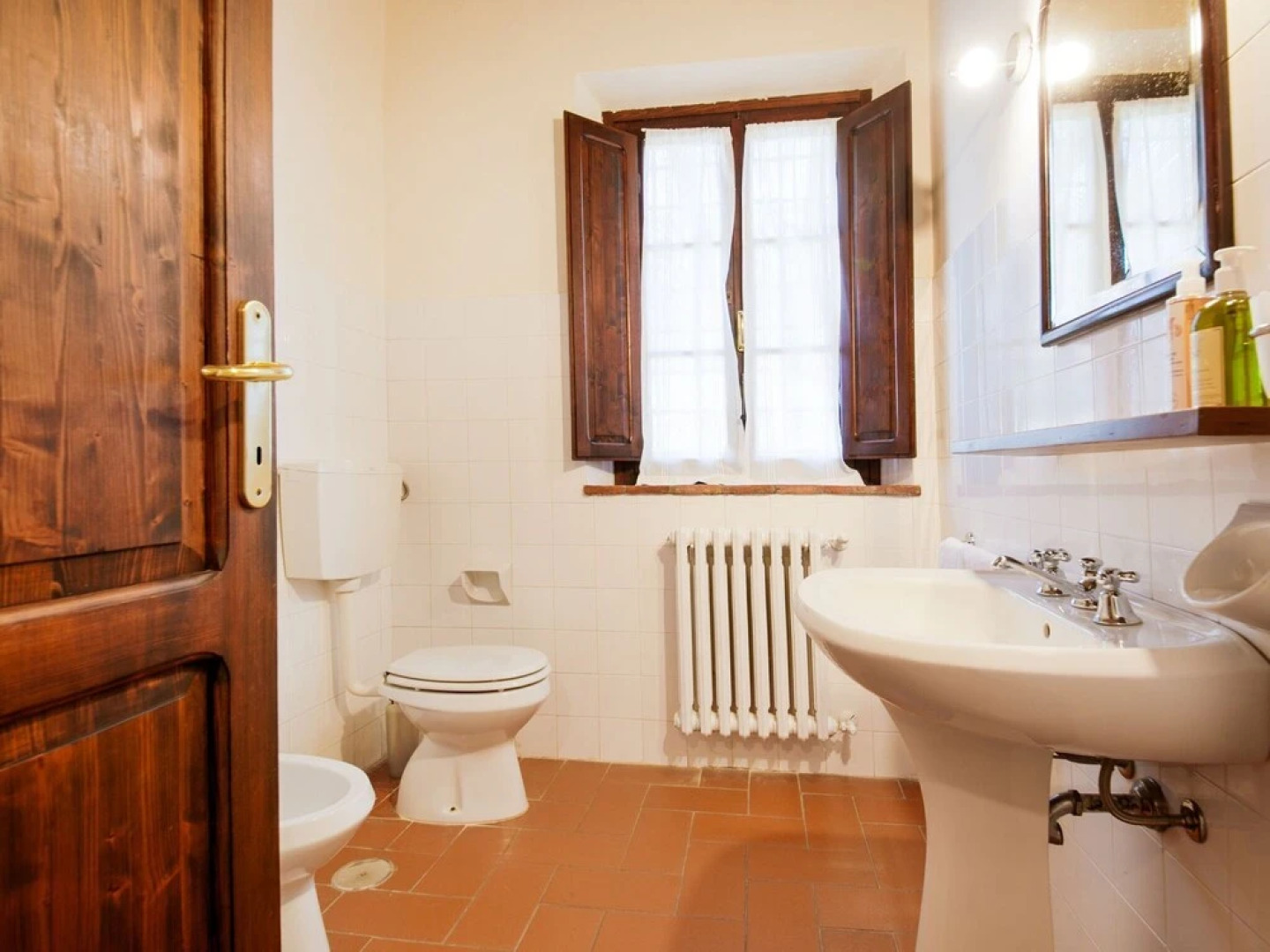 small village of beautiful apartments in the green Tuscan hills and olive groves