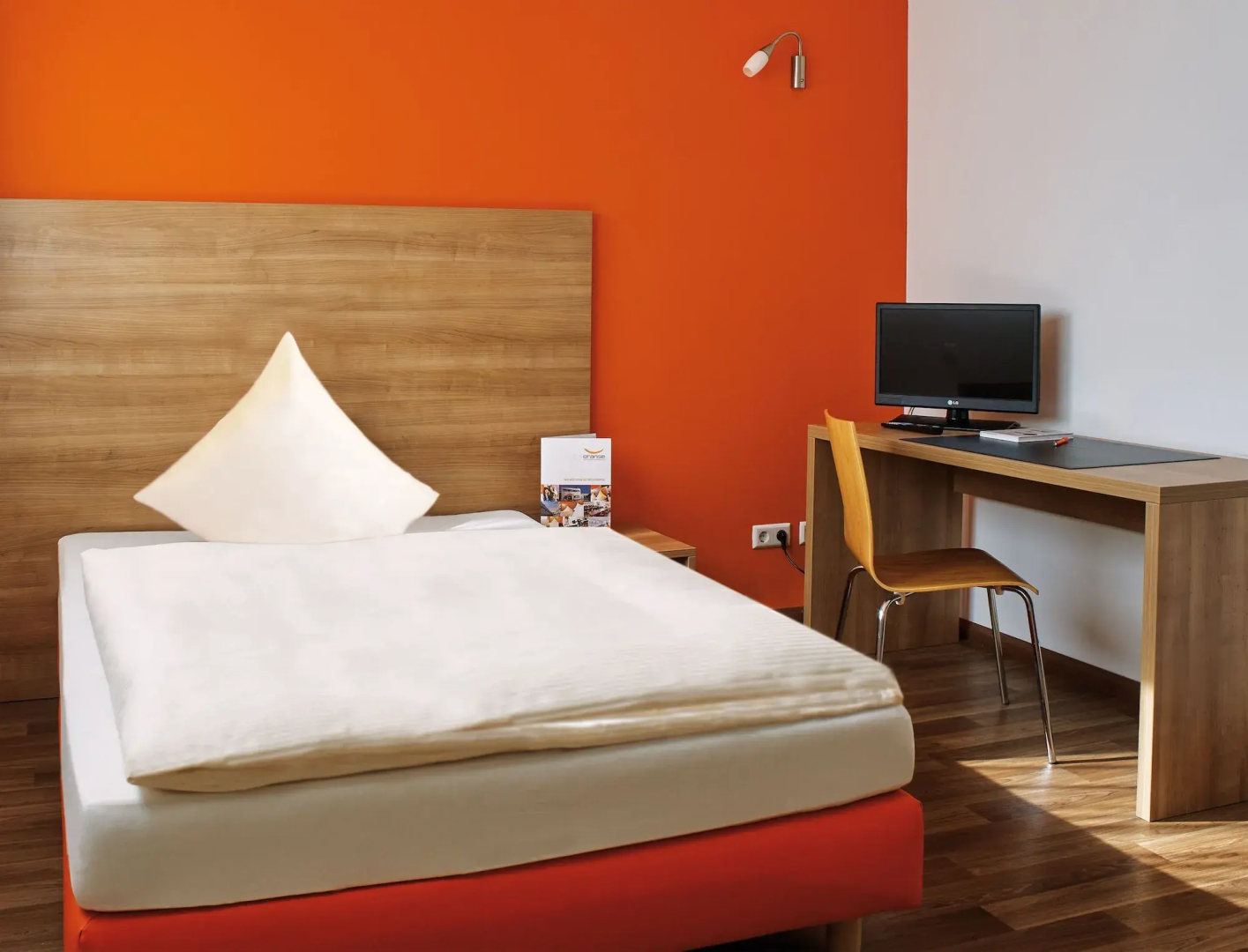 Orange Hotel und Apartments