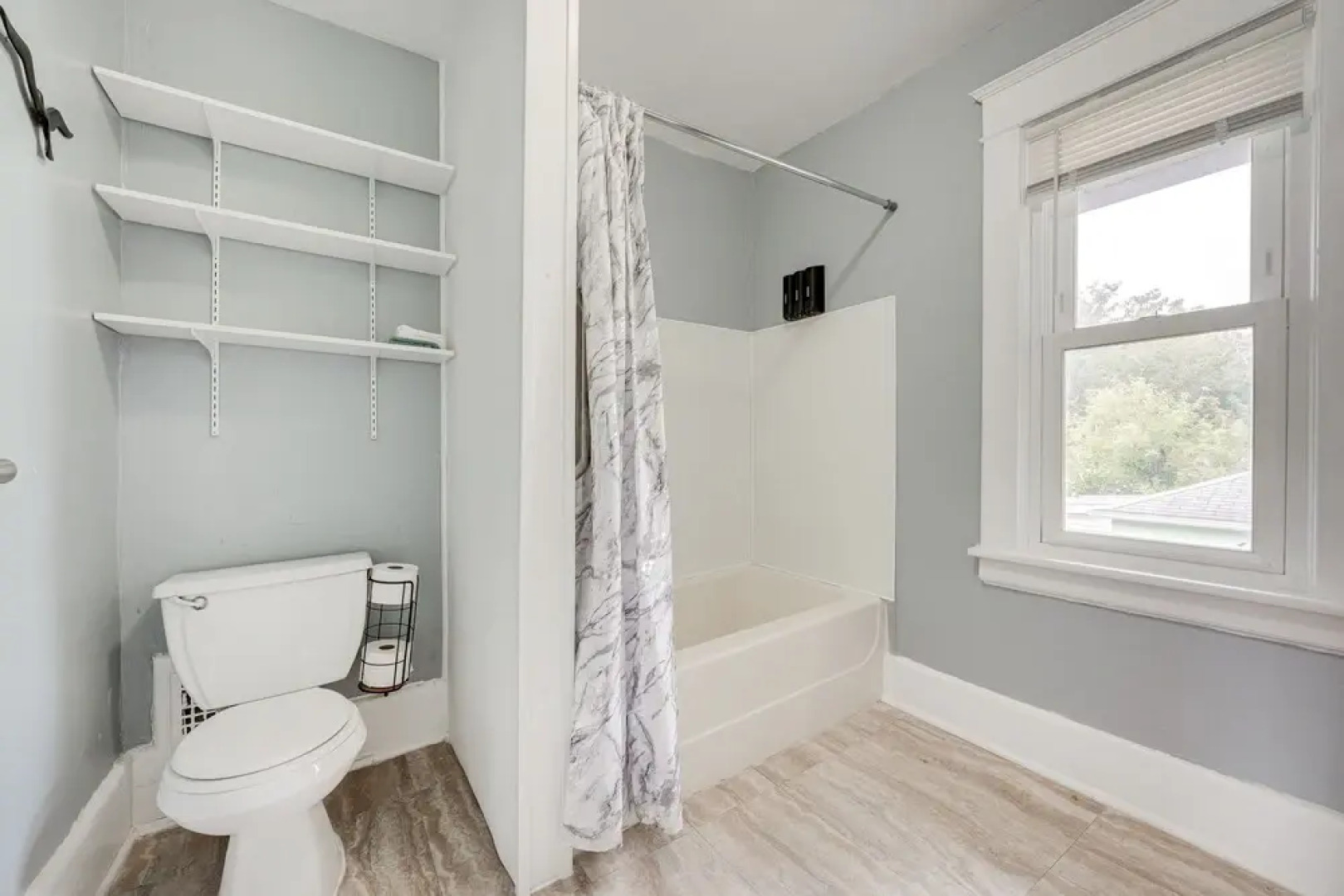 Centrally Located Albion Home With Screened Porch!