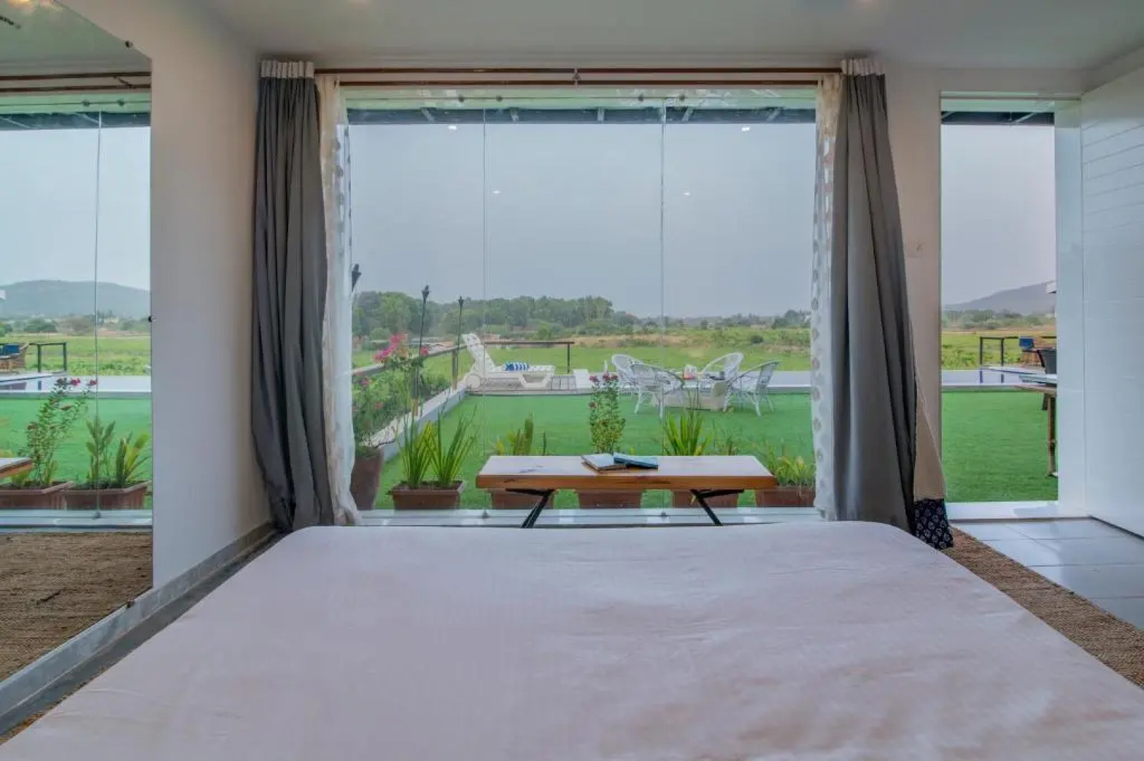 SaffronStays Onellaa, Nashik - infinity pool villa surrounded by a vineyard