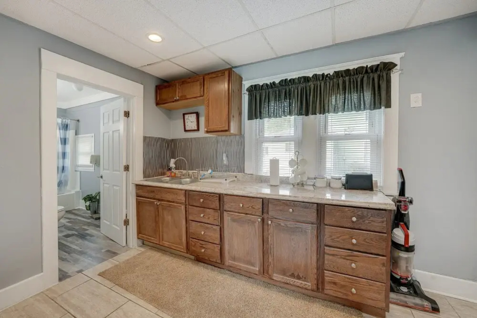 Centrally Located Albion Home With Screened Porch!