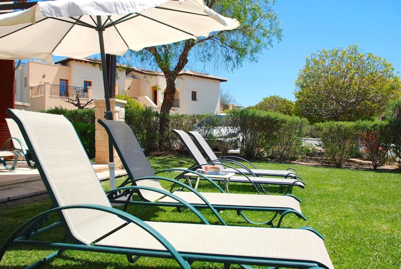 Charming 2 bedroom ground floor apartment 'CB01' - with private garden, communal pool and resort facilities, Theseus Village on Aphrodite Hill