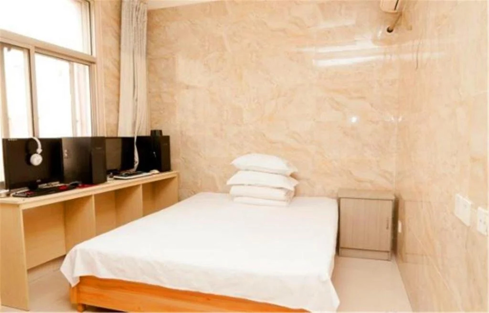 Binzhou Boxing Zhixing Wangluo Inn