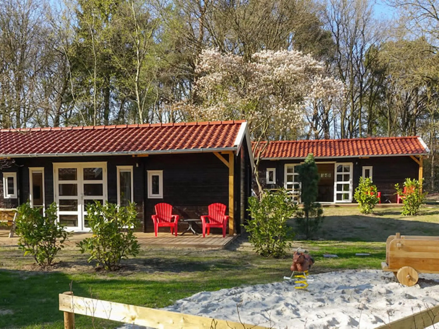 Wooden chalet with microwave, on a holiday park near three national parks