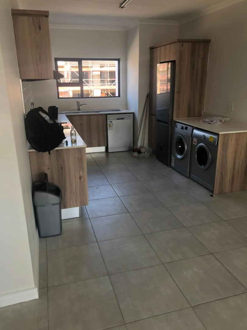 A Coastal/island experience at a Large 2 bed apartment at a Crystal Lagoon Estate.