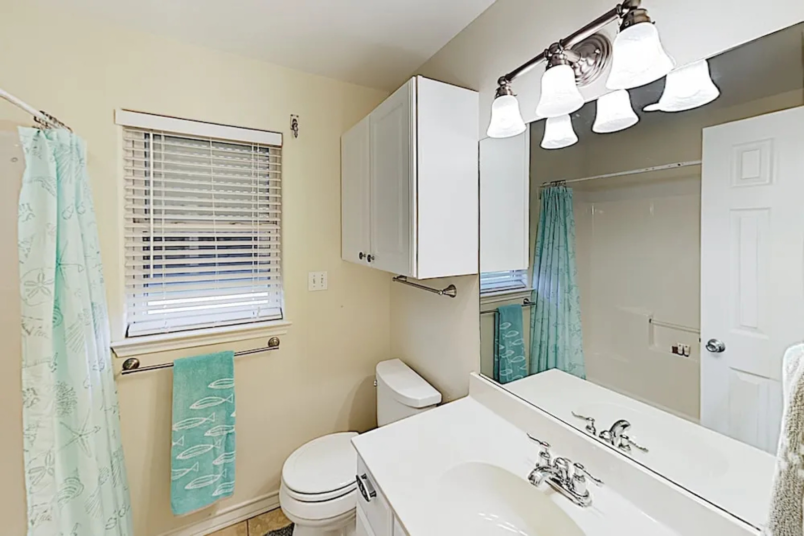 Canal-front Getaway W/ Enclosed Deck & Boat Dock 4 Bedroom Home