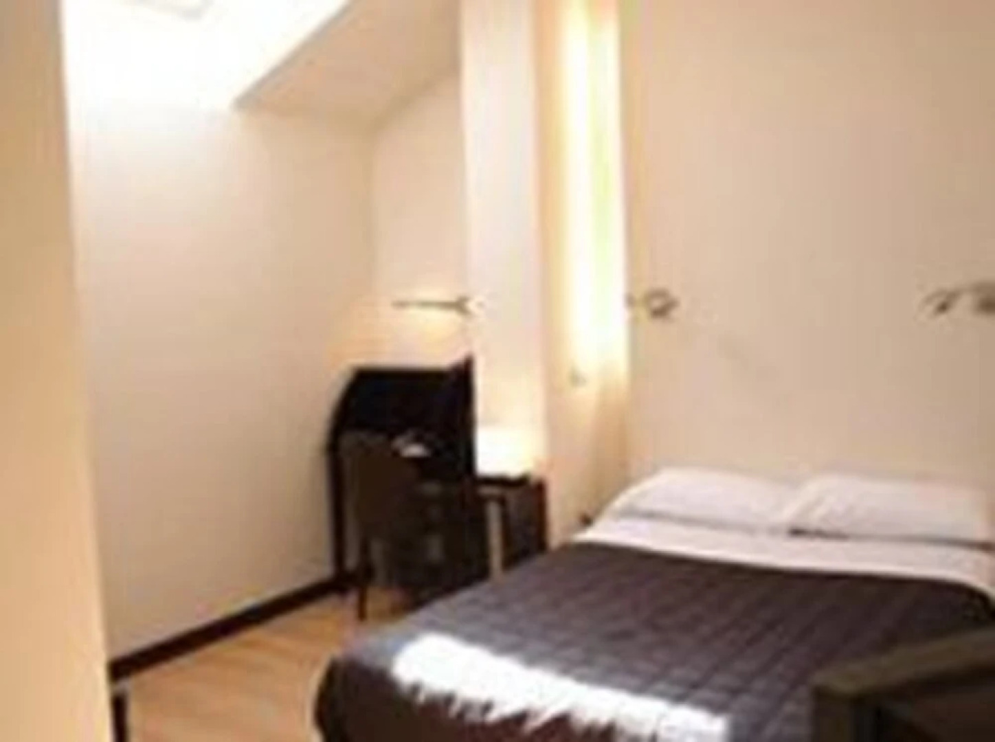 Hotel Asador H.M. Versus