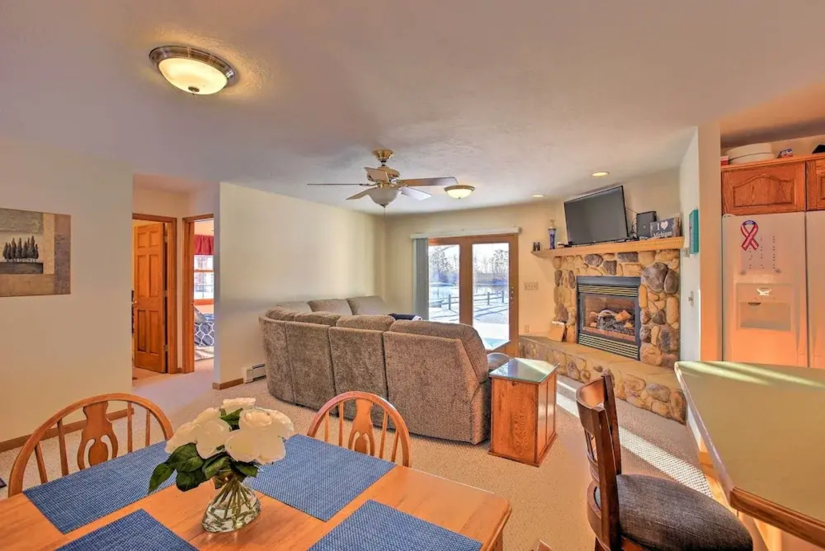 Cozy Riverfront Home w/ Fire Pit in Houghton Lake!