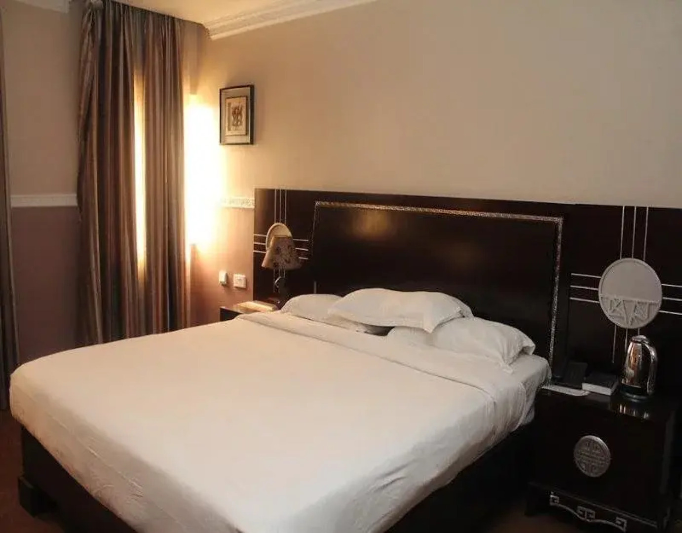 Carat 24 Business Hotel and Suites LTD