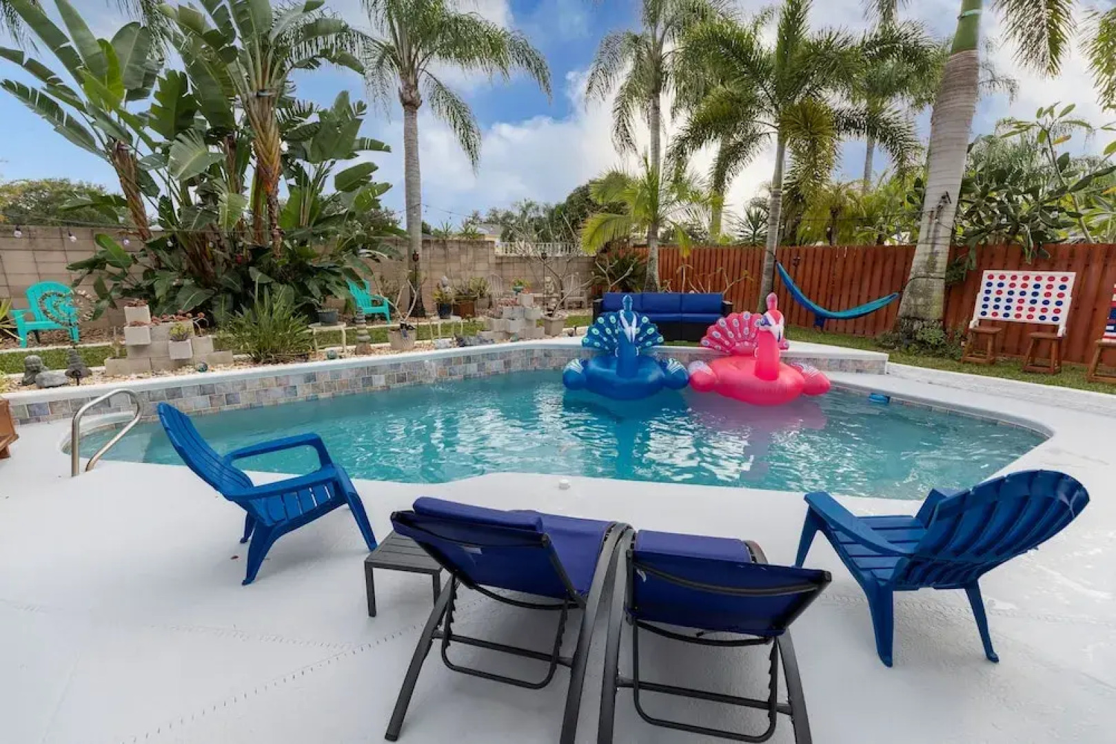 Urban Oasis W/hot Tub, Heated Pool And Private Movie Theater 2 Bedroom Home by RedAwning