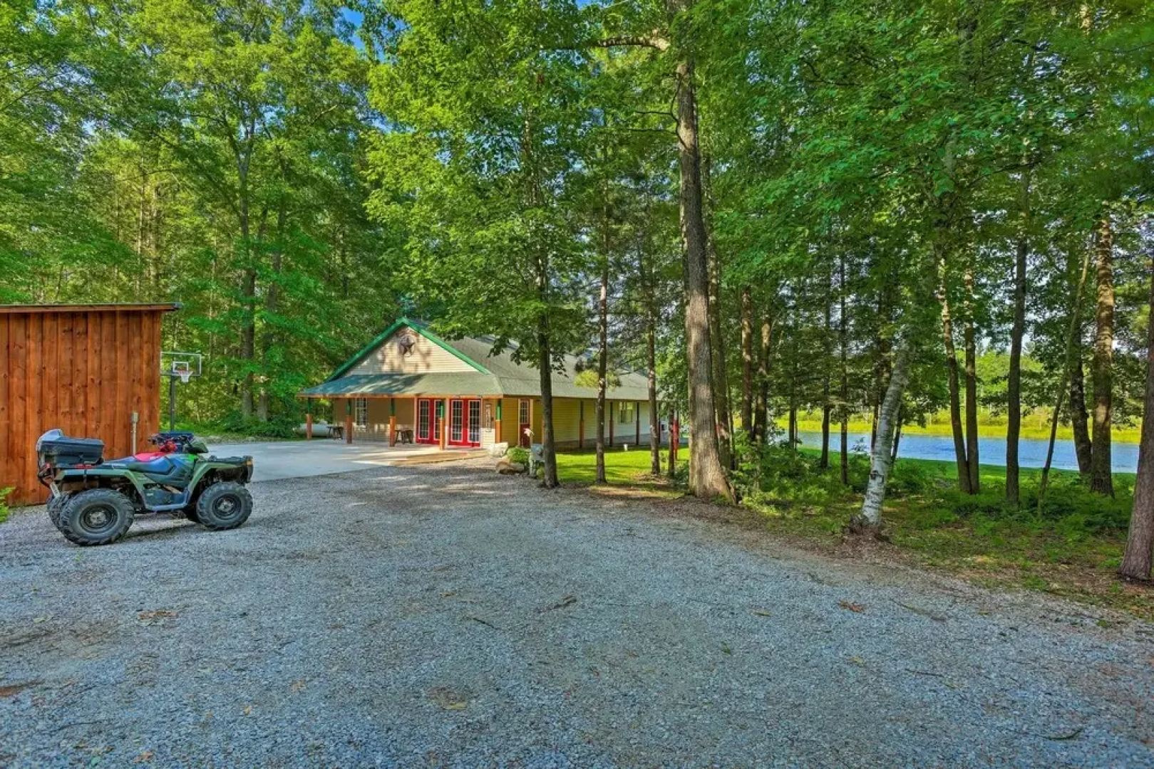 Sun-dappled Cadillac Gem w/ Kayaks & Grill!