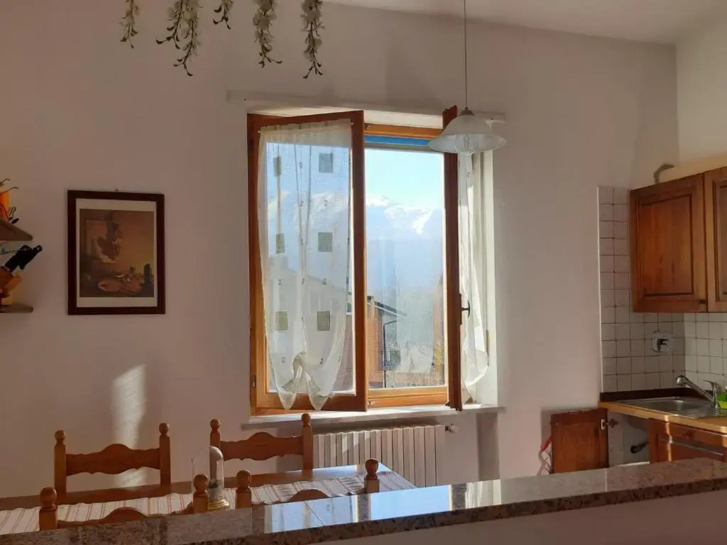 Bilocale Tití, soleggiato con vista montagne