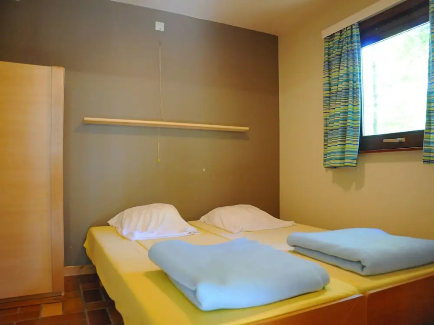 Wooden Chalet With Stove and Microwave Located in the Forest