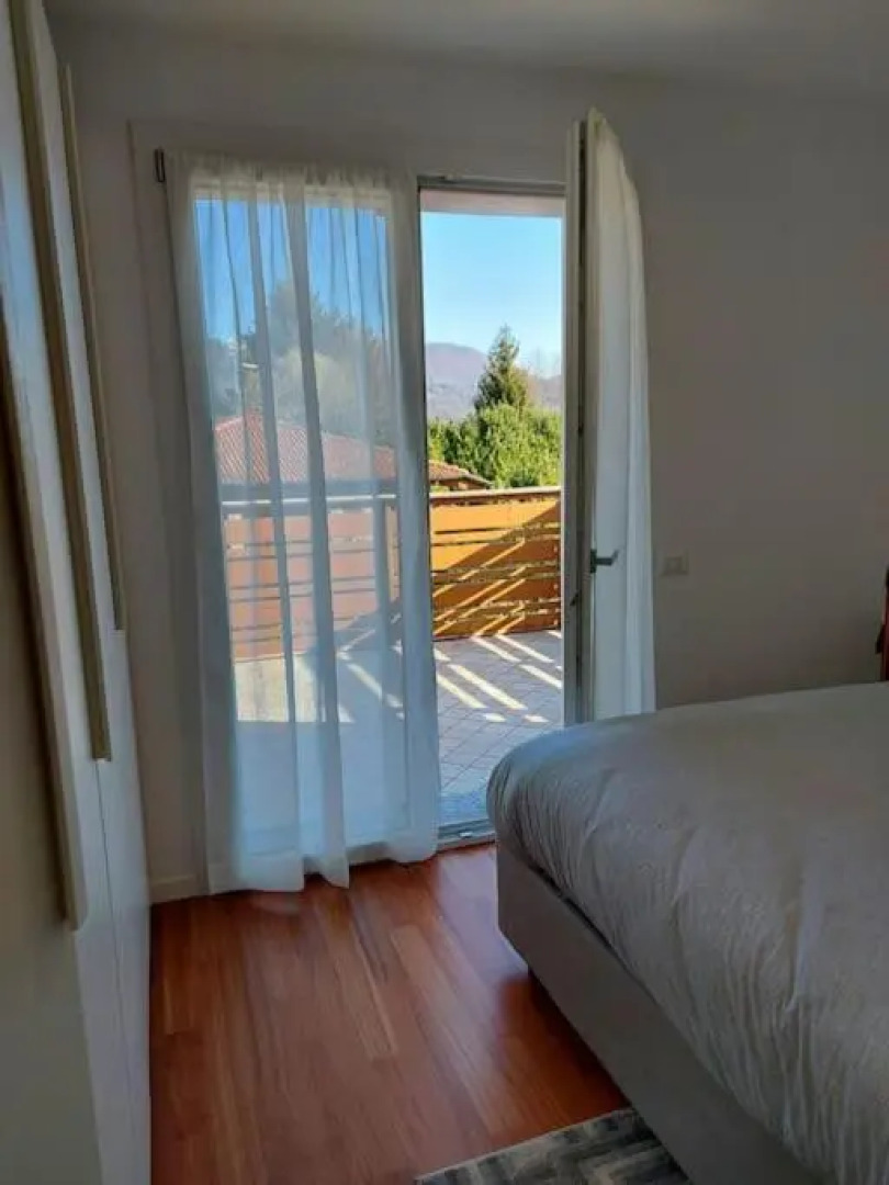 Incantevole appartamento con piscina e vista monti