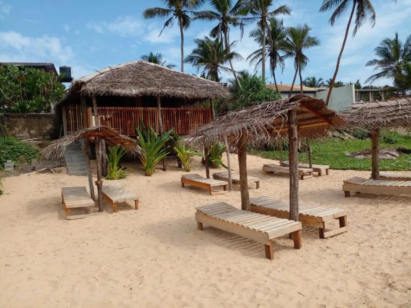 Malika's Yellow House