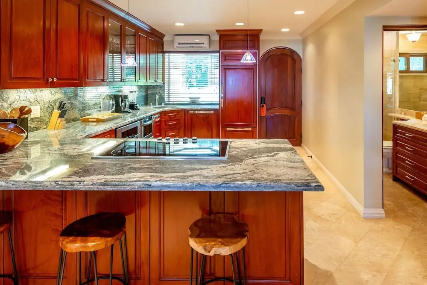 Stylish Split-Level Condo with a Shaded Terrace, Direct Beach Access, and Resort-Style Community Amenities