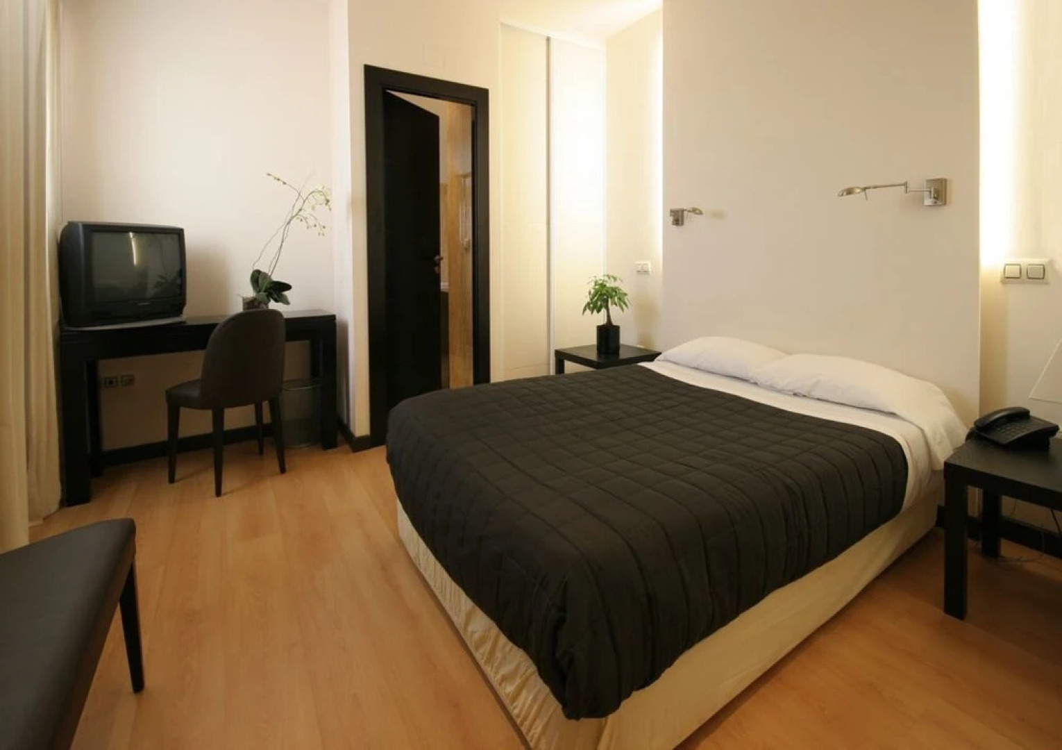 Hotel Asador H.M. Versus