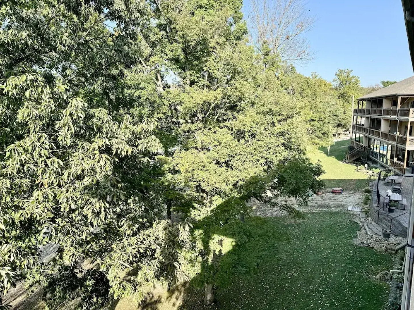 Upper level Condo A-7 with Large Private Balcony by RedAwning