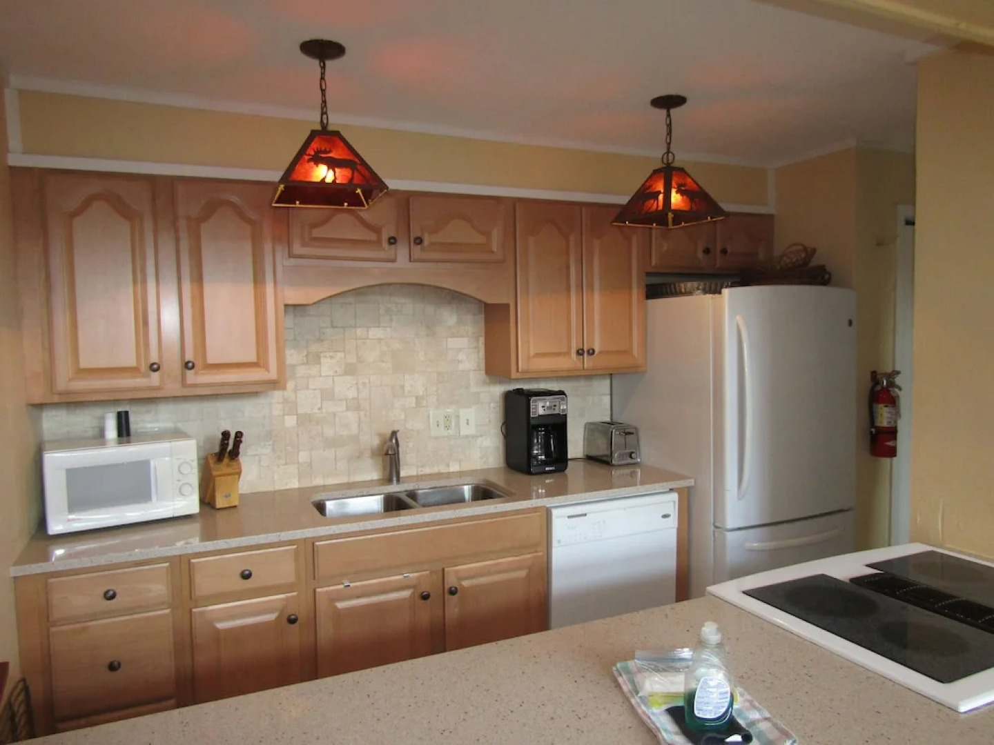 High Ceiling Skyleaf A9 Condo with Fireplace by RedAwning