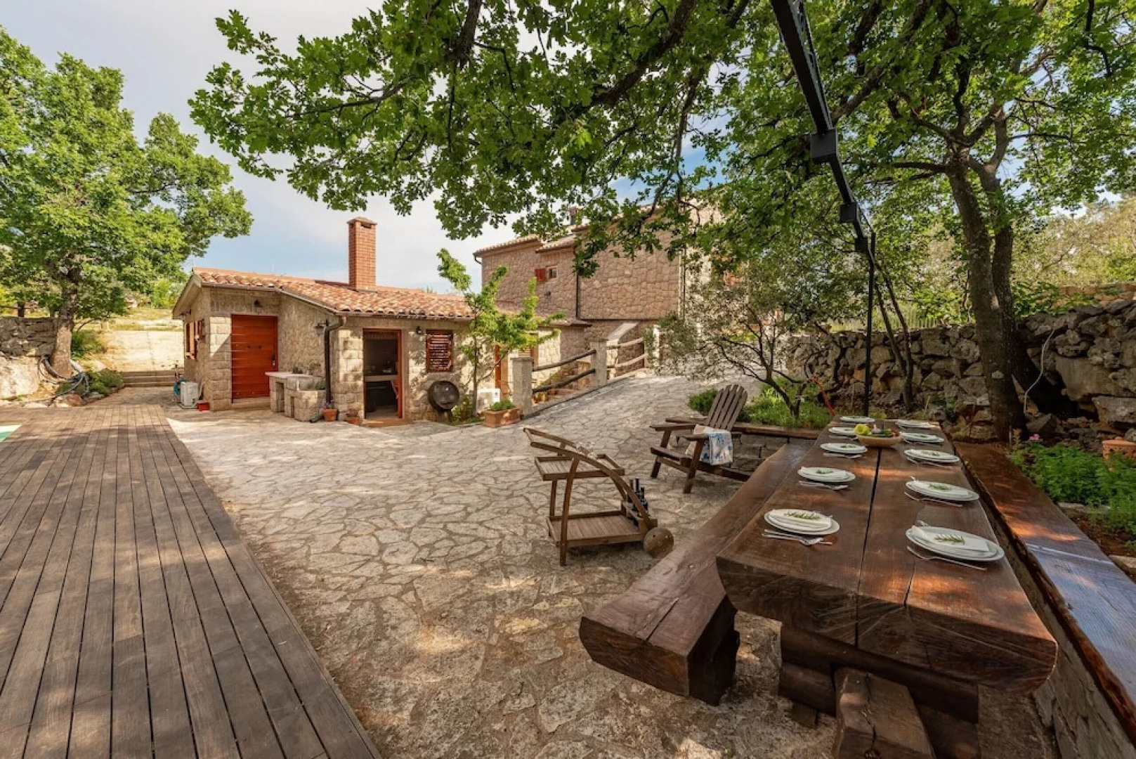 Stone house M&A with pool