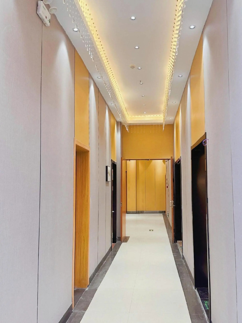 Wanjia Business Hotel (Zaozhuang Maoyuan)