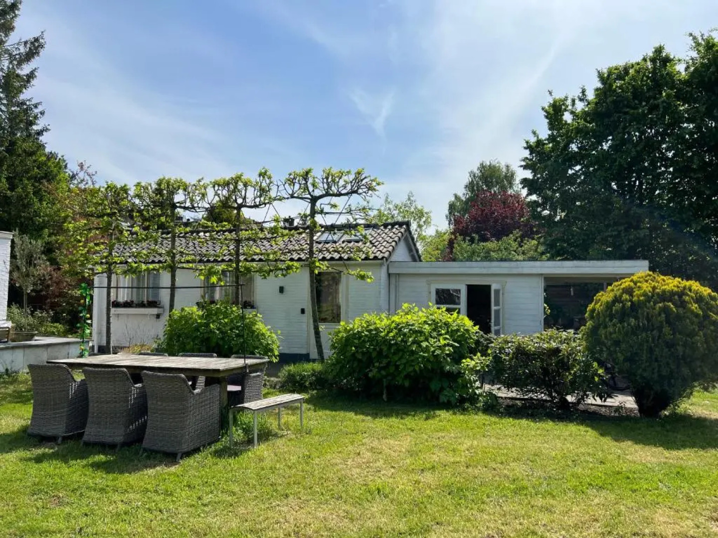 Tiny house in tuin van de statige villa Mariahof