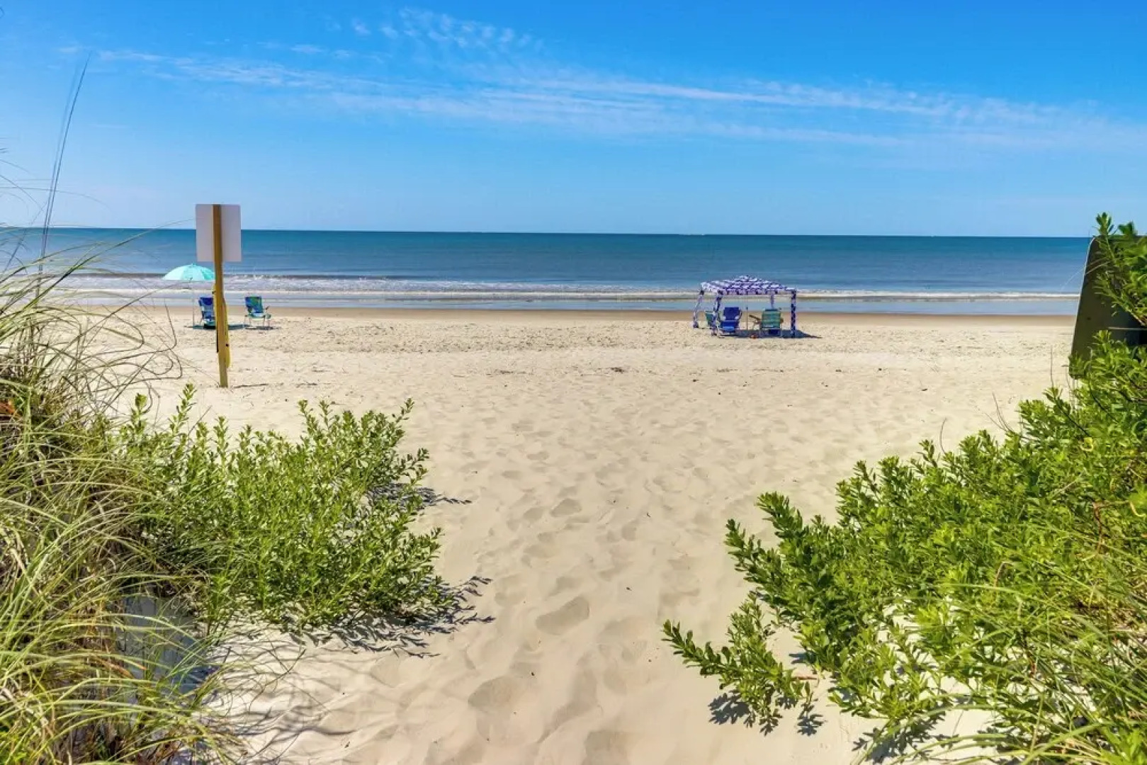 Oak Island Condo w/ Ocean View: Steps to Beach!