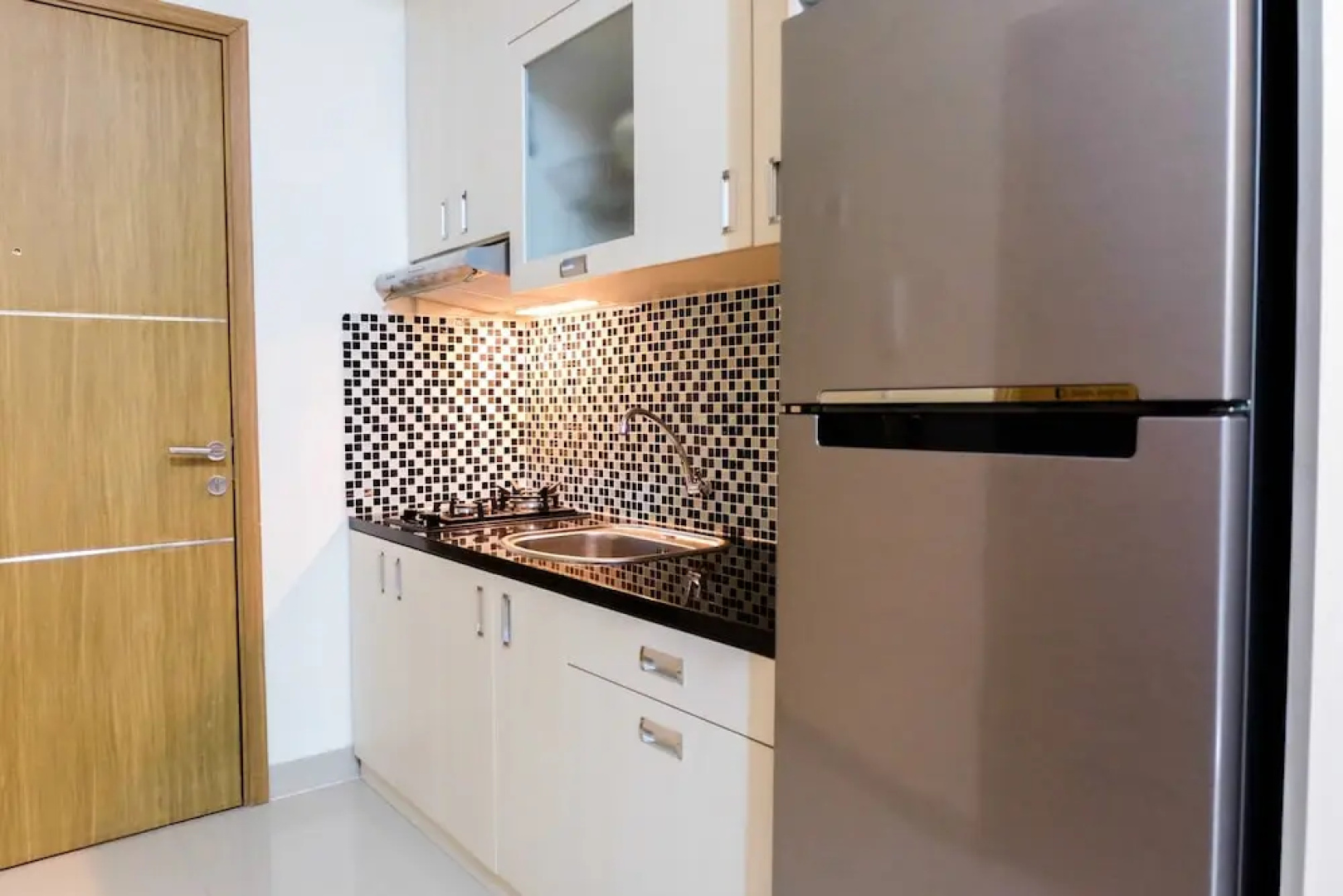 Warm and Homey Studio at The Oasis Cikarang Apartment By Travelio