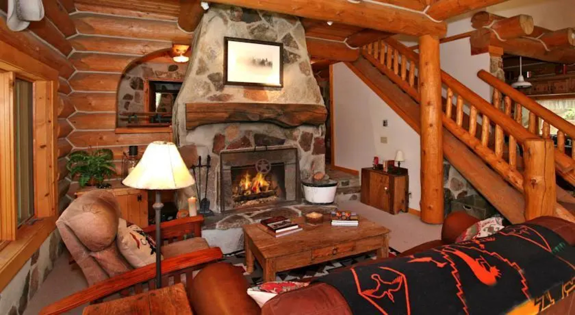 Red Roof On The River by Stewart Mountain Lodging