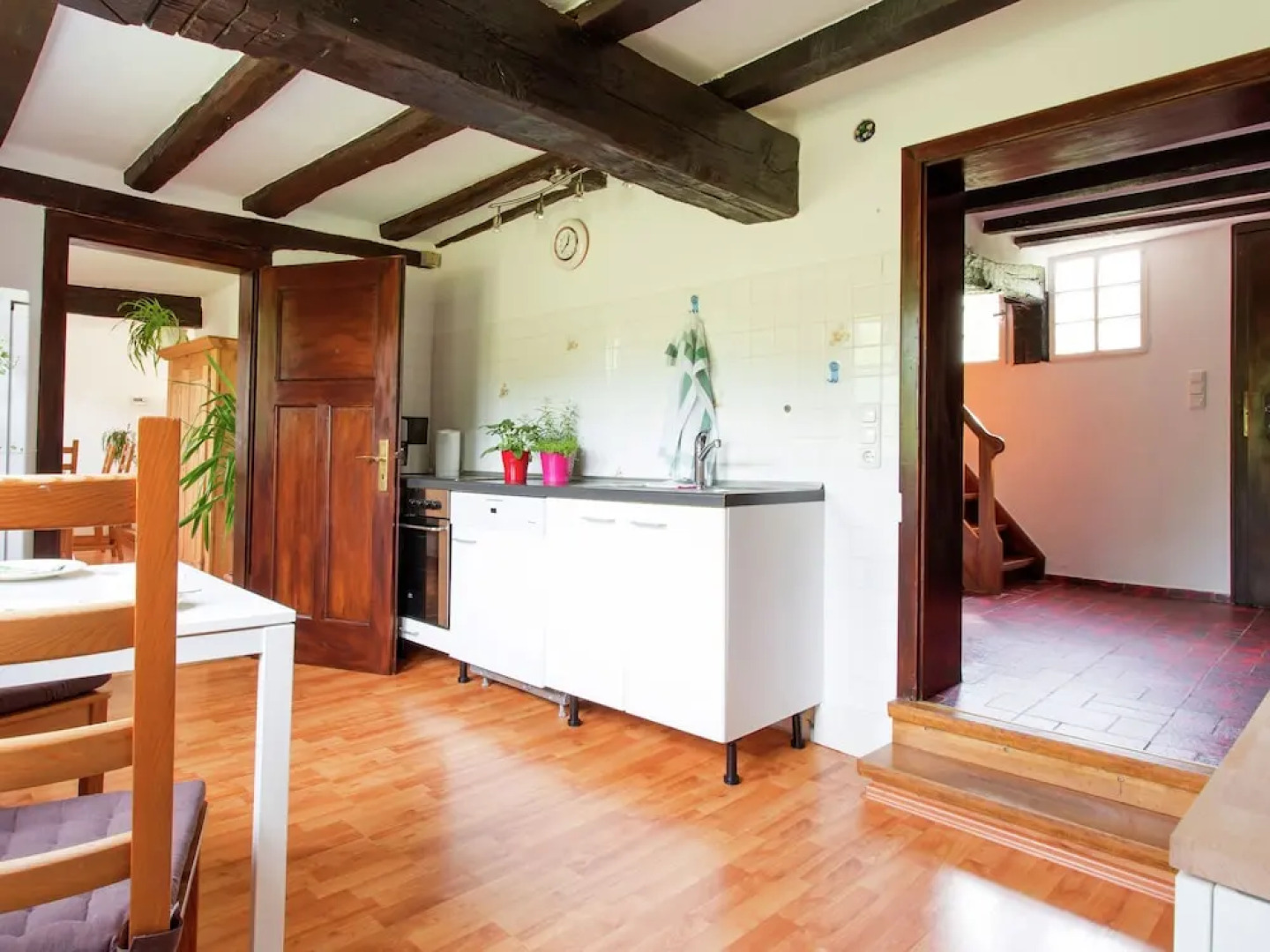 A Lovely Watermill Surrounded by Delightful Greenery