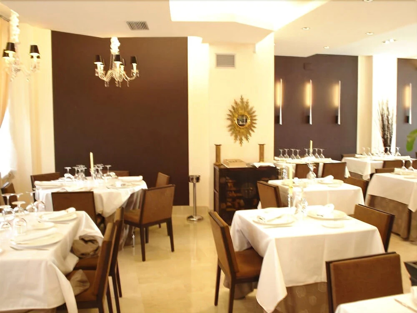 Hotel Asador H.M. Versus