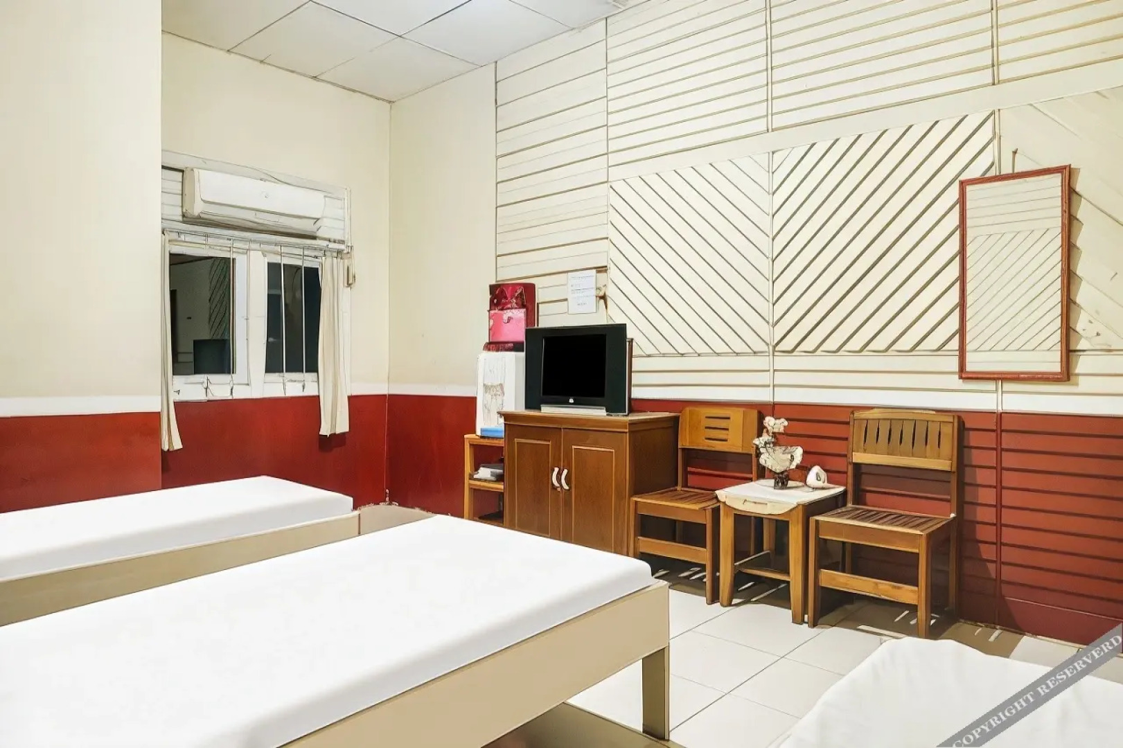 SPOT ON 91833 Hotel Anggrek Daqu Syariah Kapuas