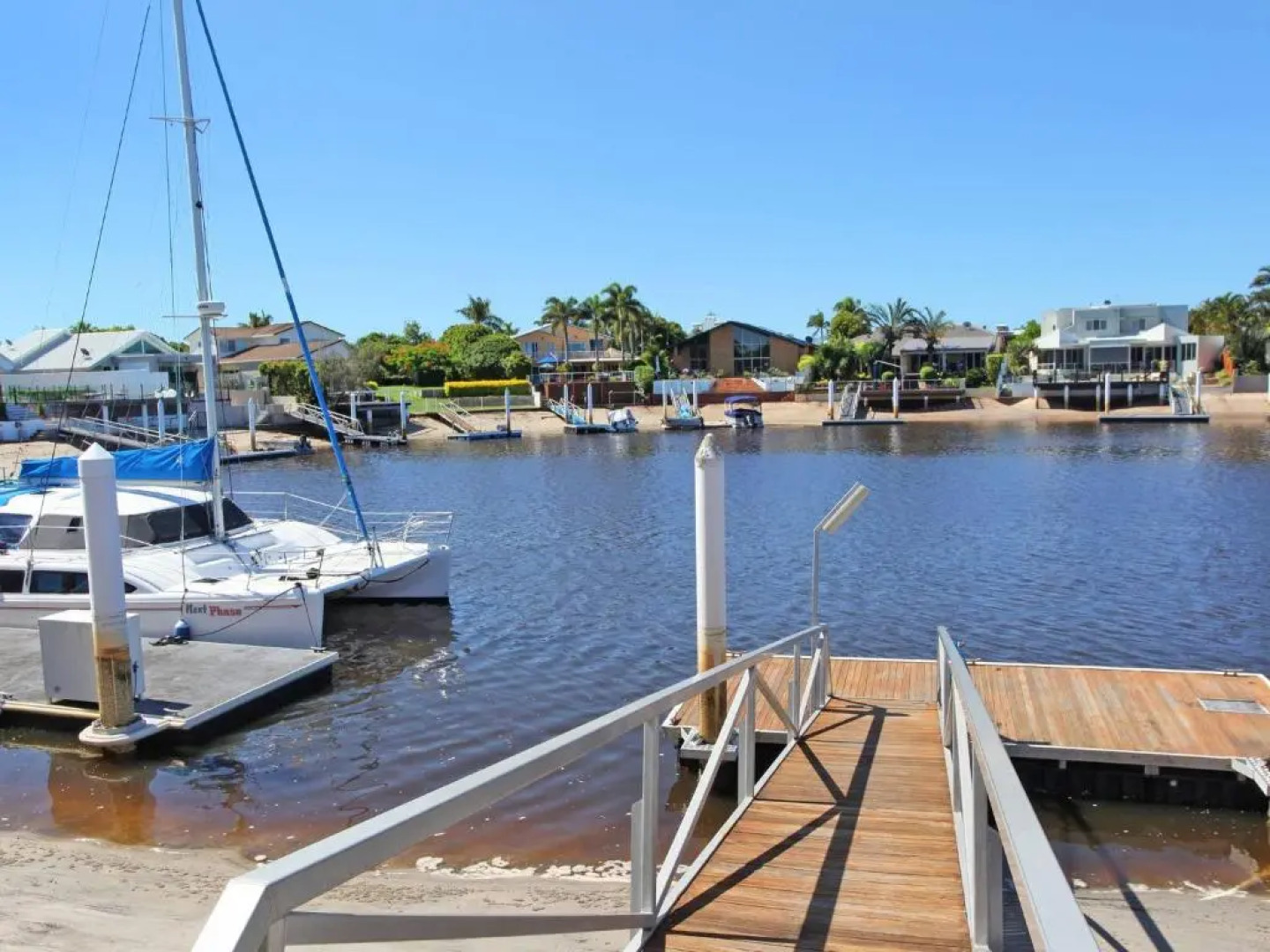 Outstanding Waterfront Hamptons Style 5 Bedroom Luxurious Home with Air Conditioning Pool and Pontoon -Bring your own boat