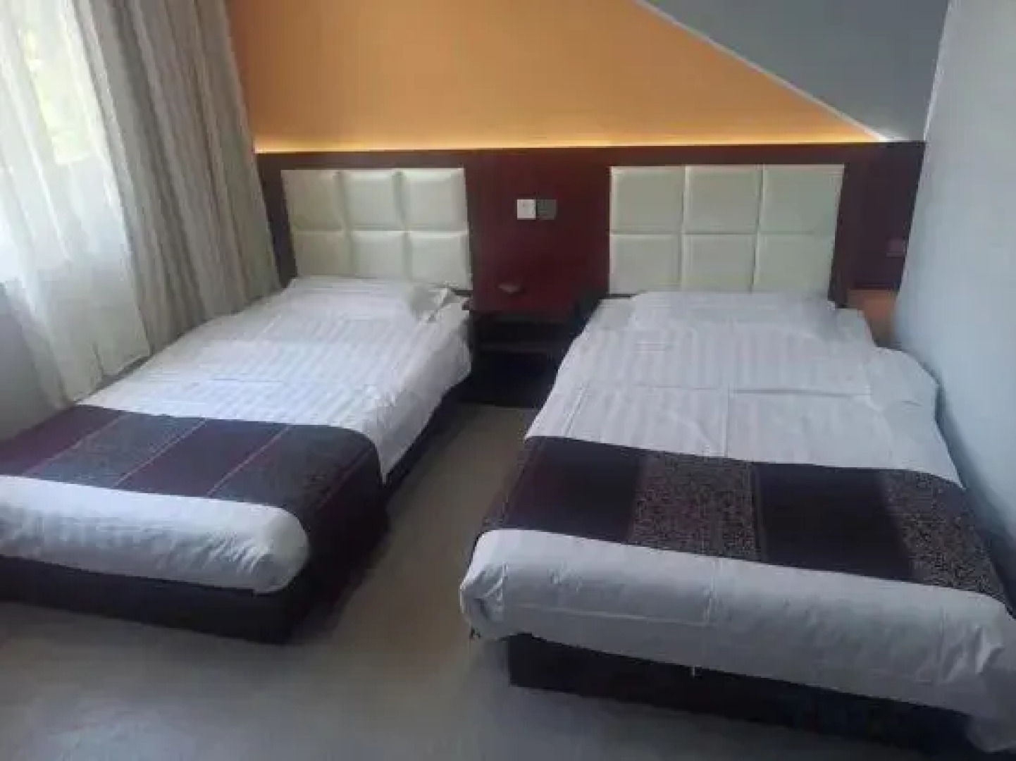 Home Inn Huaxuan Hotel (Duolun Longzehu Branch)