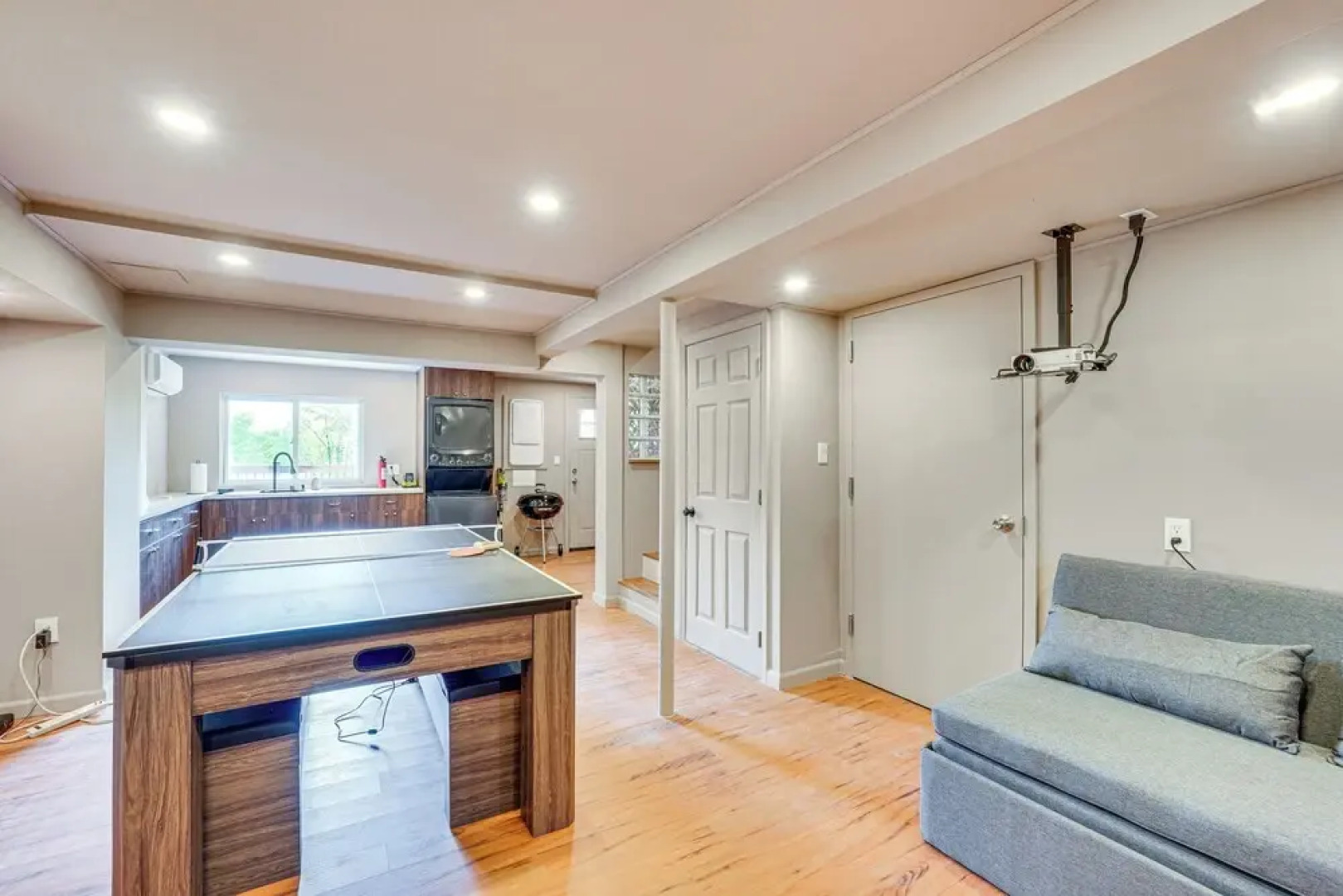 Game Room & Yard: Mid-century Modern Kingston Home