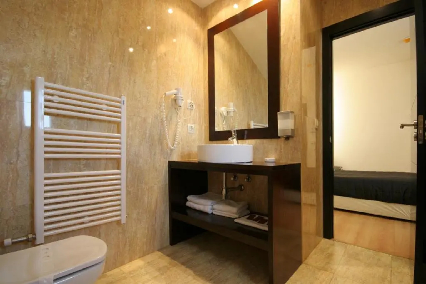 Hotel Asador H.M. Versus