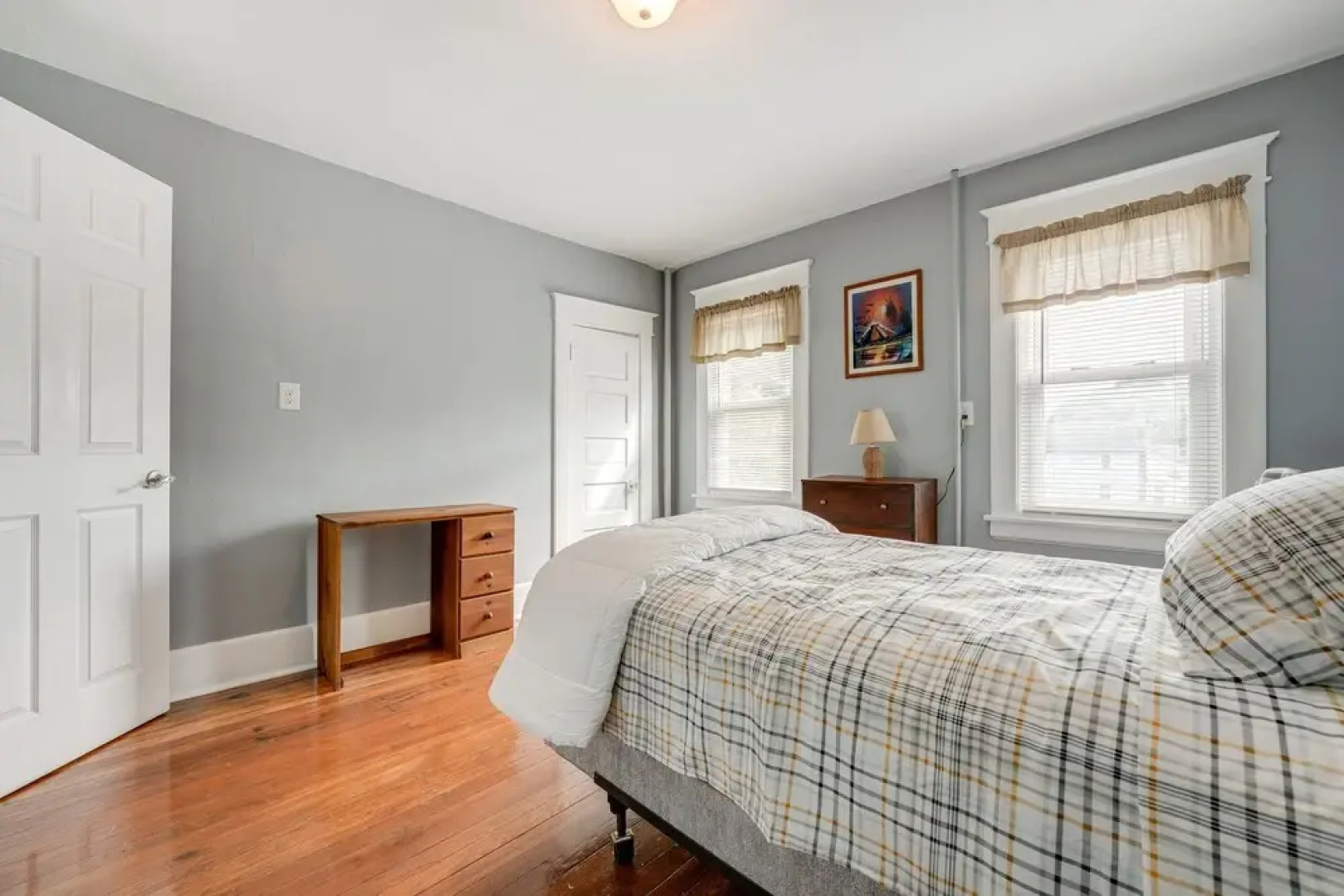 Centrally Located Albion Home With Screened Porch!