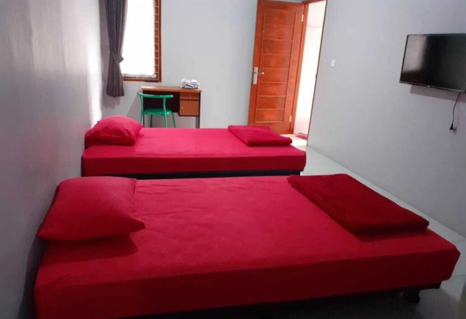 Nabila Syar i Guesthouse by ZUZU